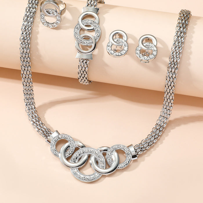 Wholesale Exquisite five piece set of fashionable jewelry for women, gorgeous rhinestone cross ring necklace, earrings, bracelet, ring set