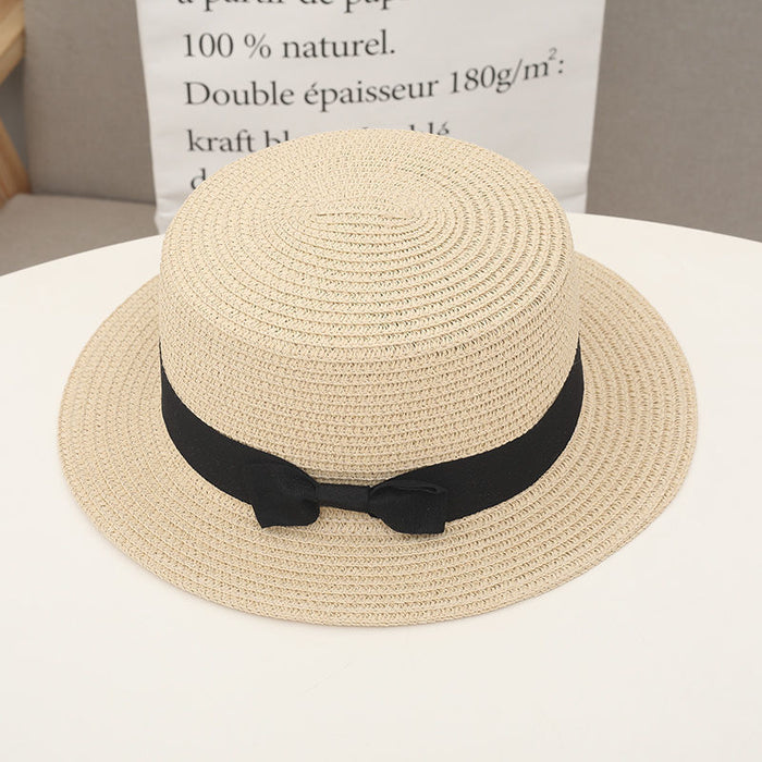 Wholesale New wide eave flat top straw hat for sun protection, vacation bow top hat for versatile sun protection