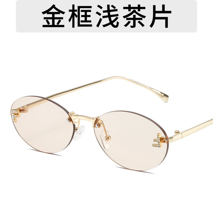 Wholesale Elliptical frame small frame sunglasses, new frameless cut edge personalized glasses, dot diamond sunglasses
