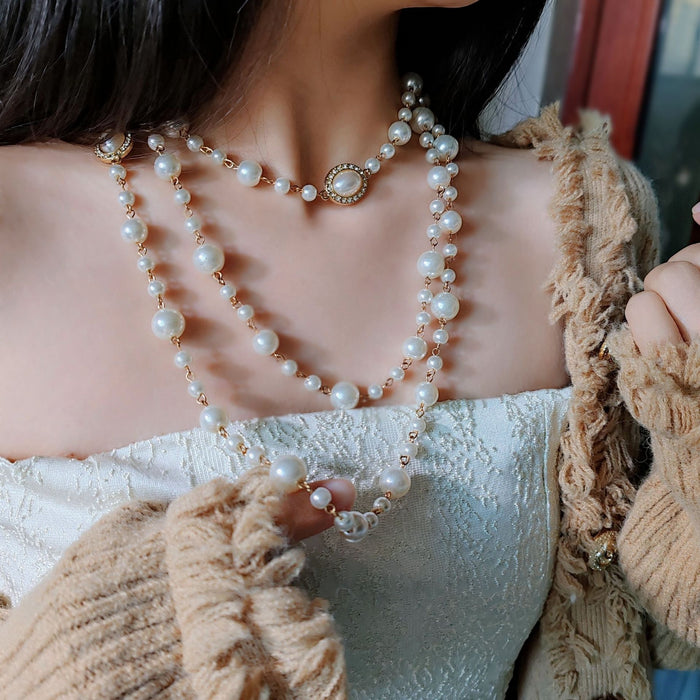 Wholesale Exaggerated long pearl necklace with multiple layers of light luxury niche sweater chain