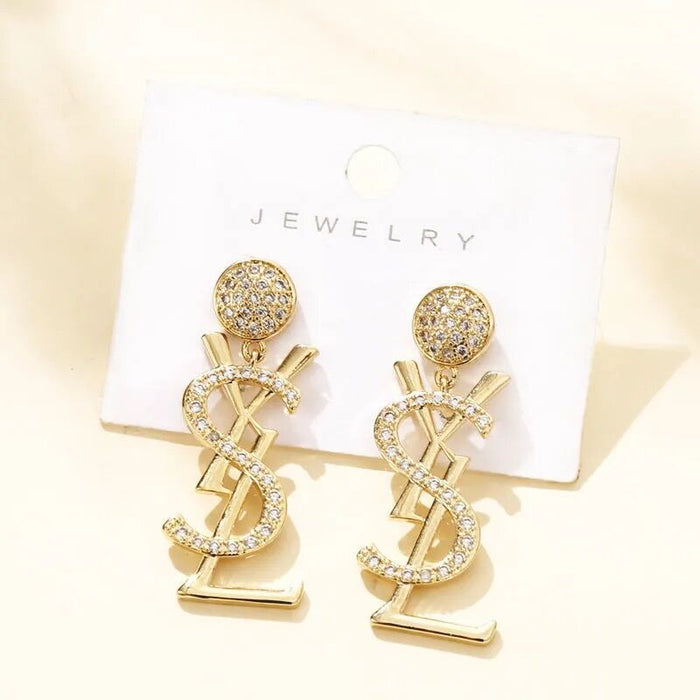 Wholesale Silver needle copper micro inlaid letter earrings new trendy round face slimming and long style retro Hong Kong style light luxury earrings