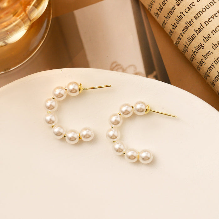 Wholesale Circle pearl earrings with a high-end feel, new round earrings, and earrings