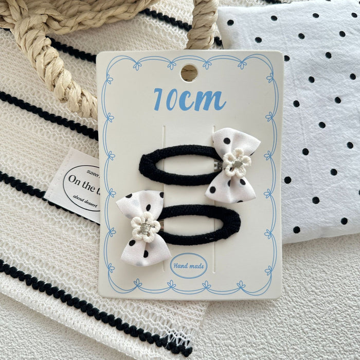 Wholesale Sweet bow hair clip with water droplets, wavy dots, children's fabric, side broken hair, wavy dots, bangs clip