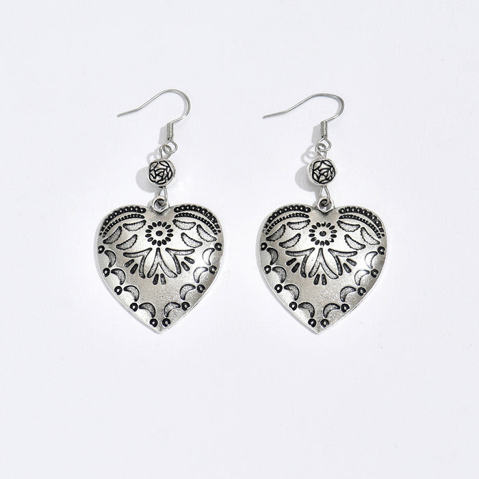 Wholesale Fashionable retro heart-shaped earrings with a vintage and exaggerated design, silver peach heart earrings and earrings