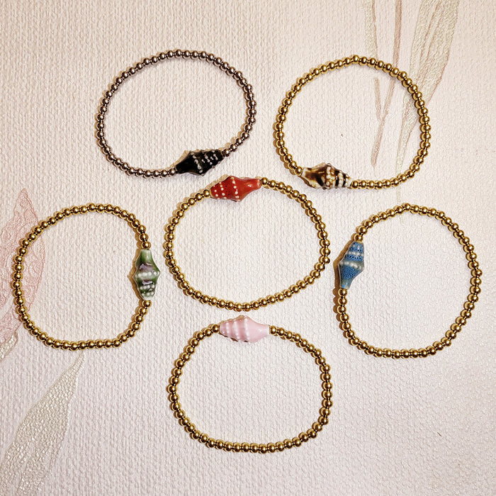 Wholesale Swimming wearable mini bracelet accessory ceramic conch animal turtle titanium steel non fading bracelet