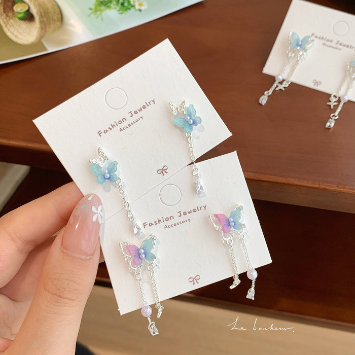 Wholesale Resin pearl butterfly earrings with tassels and silver needles, sweet temperament, light luxury, high-end feel, versatile earrings