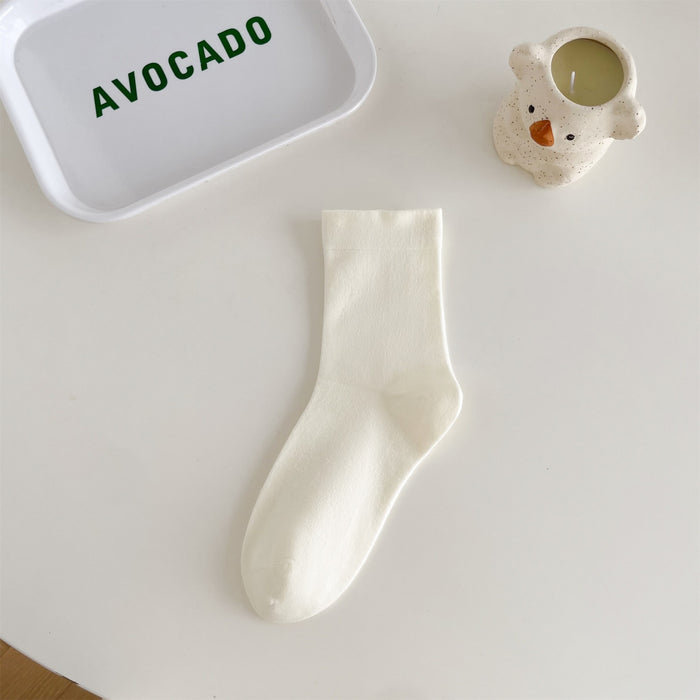 Wholesale Middle school women's solid color simple pile socks made of pure cotton