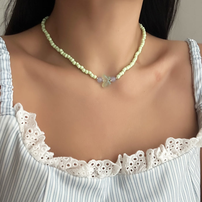 Wholesale Jewelry fashion resin bead handmade necklace sweater chain versatile butterfly collarbone chain pendant