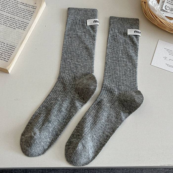Wholesale Sock fabric label letter pile socks college style versatile colorful mid tube socks
