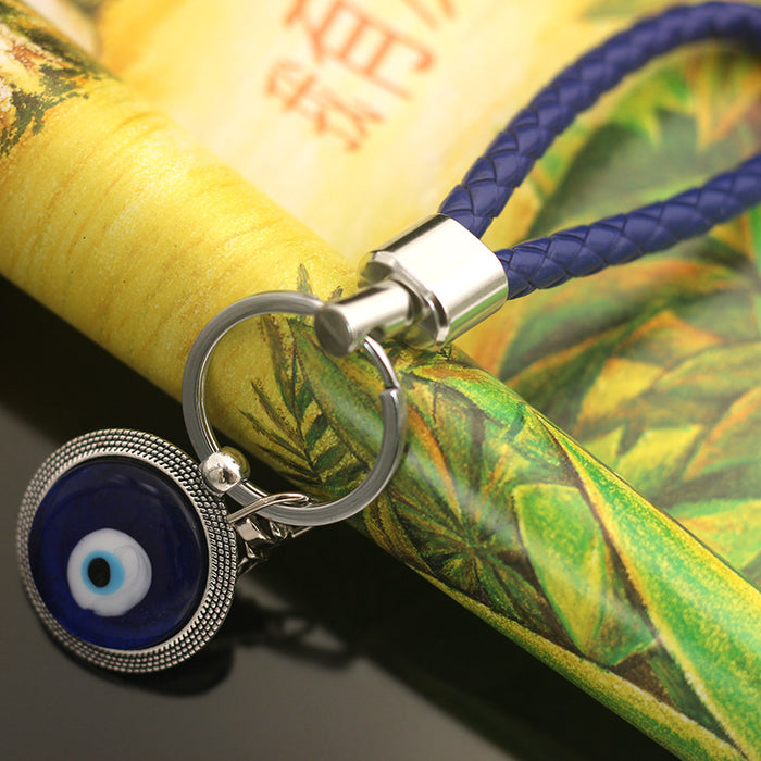 Wholesale Blue eyed blank metal keychain and chain gift keychain, fashionable and versatile