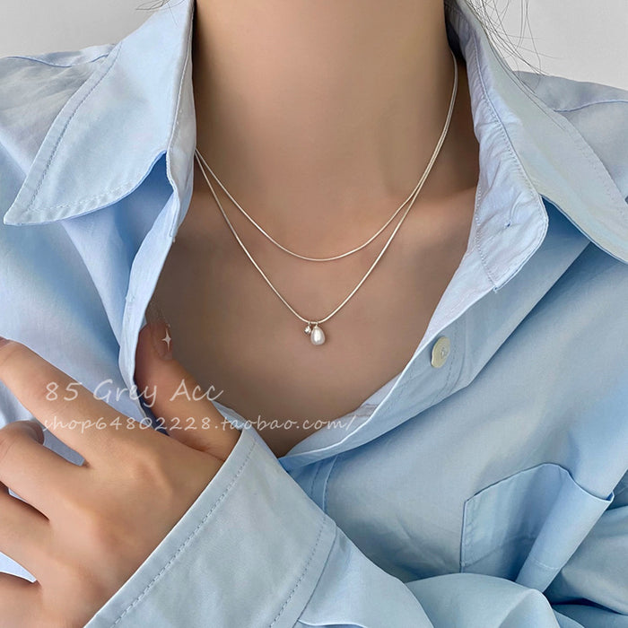 Wholesale Double layered pearl necklace for women, niche, light luxury, fashionable, collarbone chain, temperament, simple necklace