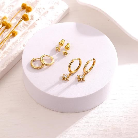 Wholesale Eight pointed star earrings copper plated with real gold, fashionable and niche design, star ear buckle wholesale