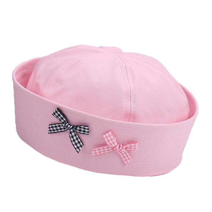Wholesale Striped bow sailor hat is lightweight, breathable, niche, and comfortable with flip over eaves