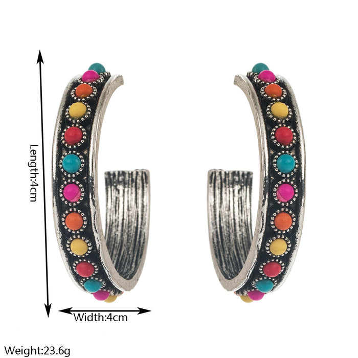Wholesale Large C-shaped alloy statement earrings set with white and turquoise