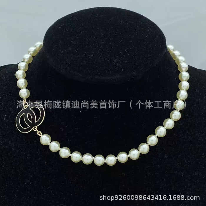 Wholesale Double C letter enamel camellia pearl long necklace