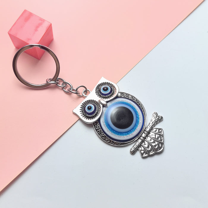 Wholesale Blue Eye Pendant Flower Butterfly Keychain Pendant Bag