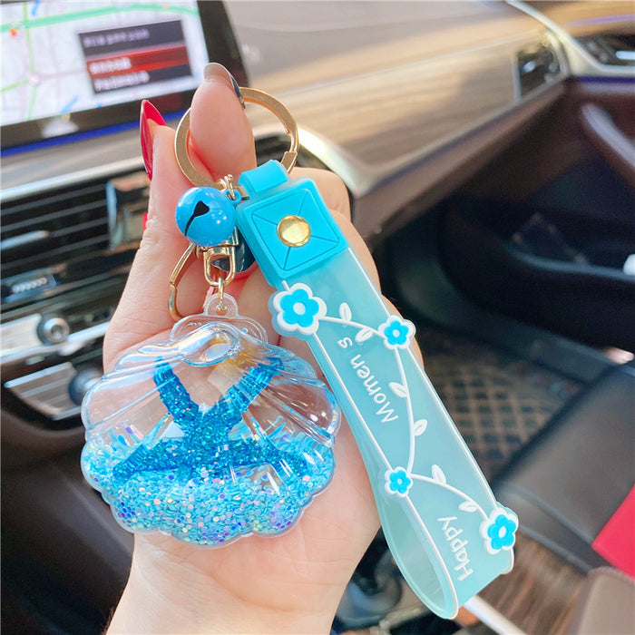 Wholesale Creative starfish floating bottle keychain acrylic oil quicksand car student backpack small gift ornaments