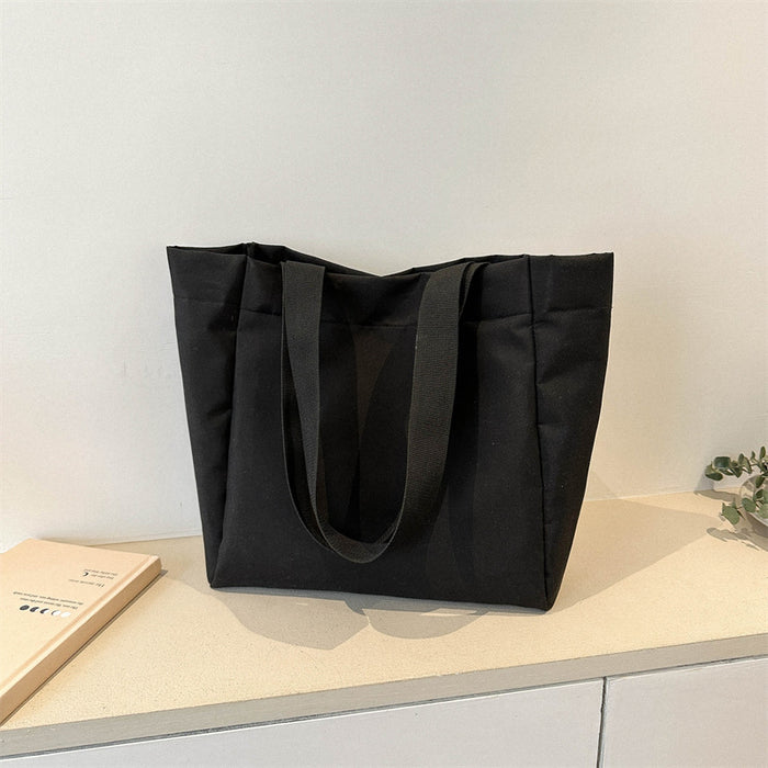 Wholesale Solid color large capacity canvas shoulder bag, simple commuting tote bag, shopping bag