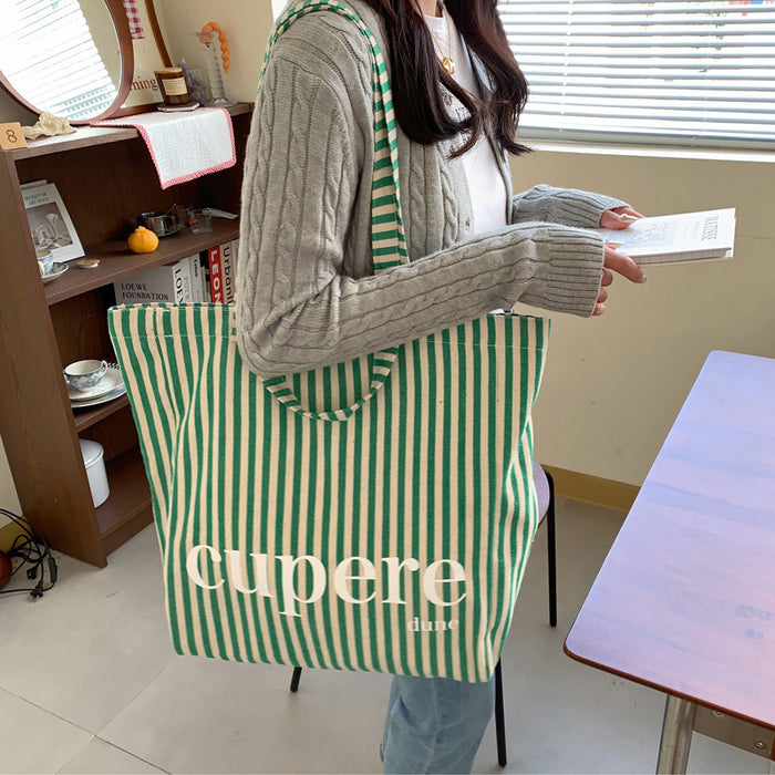 Wholesale Large capacity striped canvas backpack, casual open letter single shoulder canvas bag