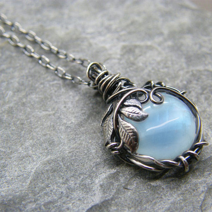 Wholesale Leaf wrapped pendant necklace, vintage imitation moonstone glass jewelry wholesale