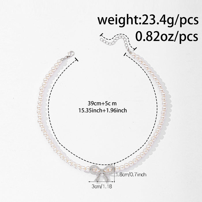 Wholesale Jewelry Fashion Pearl Necklace Versatile Diamond Set Bow Sweater Chain Versatile Pendant