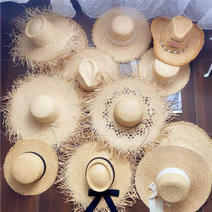 Wholesale Big brim frayed Lafite grass hat women's beach hat for beach vacation, sun protection and sunshade hat