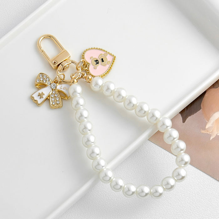 Wholesale Pearl chain beaded mobile phone lanyard bow pendant keychain