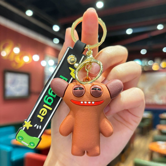 Wholesale Cartoon cute monster series girls cute keychain pendant funny doll keychain student doll small pendant