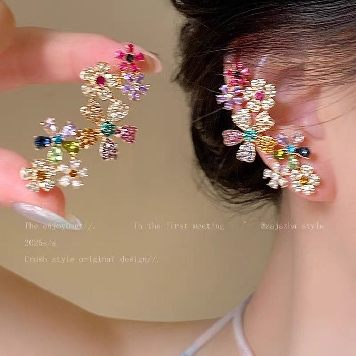 Wholesale Sparkling diamond dynamic hollow butterfly tassel earrings, light luxury temperament, high-end feeling, niche earrings, exaggerated earrings