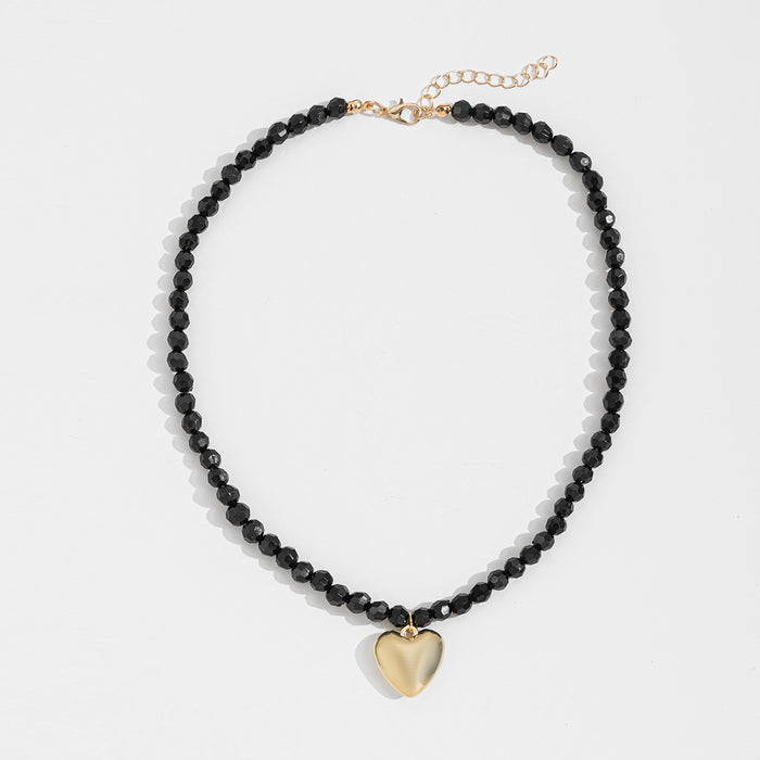 Wholesale Hot selling metal heart pendant necklace with geometric cut, personalized and fashionable peach heart necklace