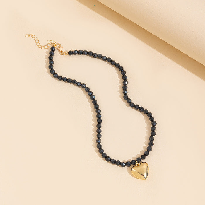 Wholesale Hot selling metal heart pendant necklace with geometric cut, personalized and fashionable peach heart necklace