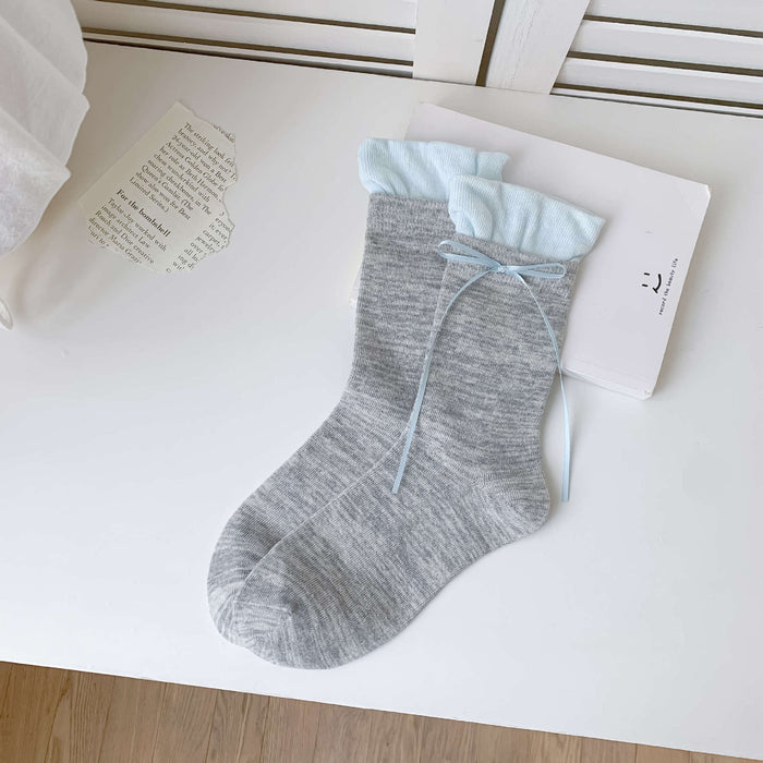 Wholesale Colorful bow tie pile socks, cute and versatile socks