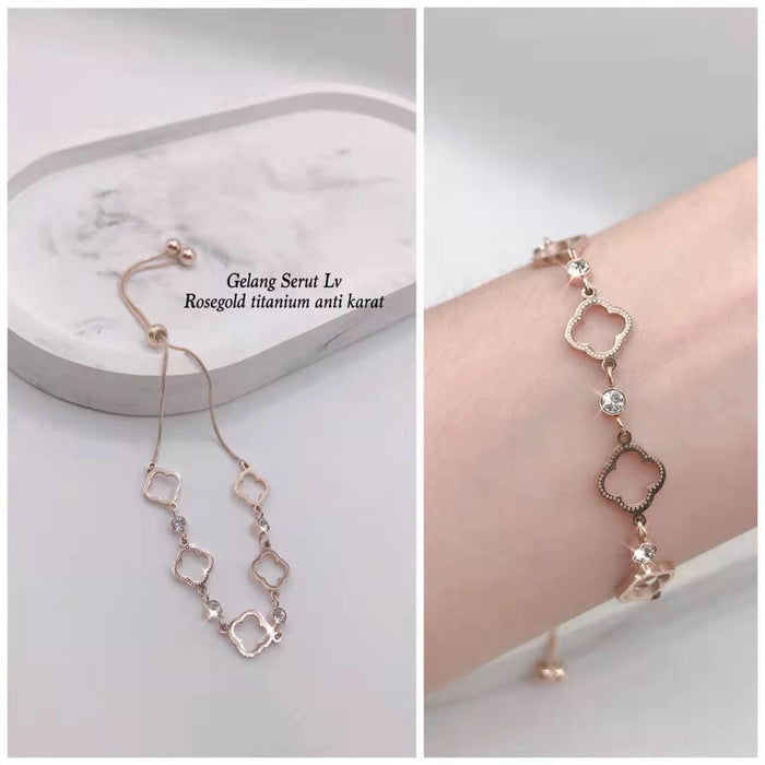 Wholesale New hollowed out clover pull-out bracelet made of titanium steel with diamonds, niche high-end handmade accessories wholesale
