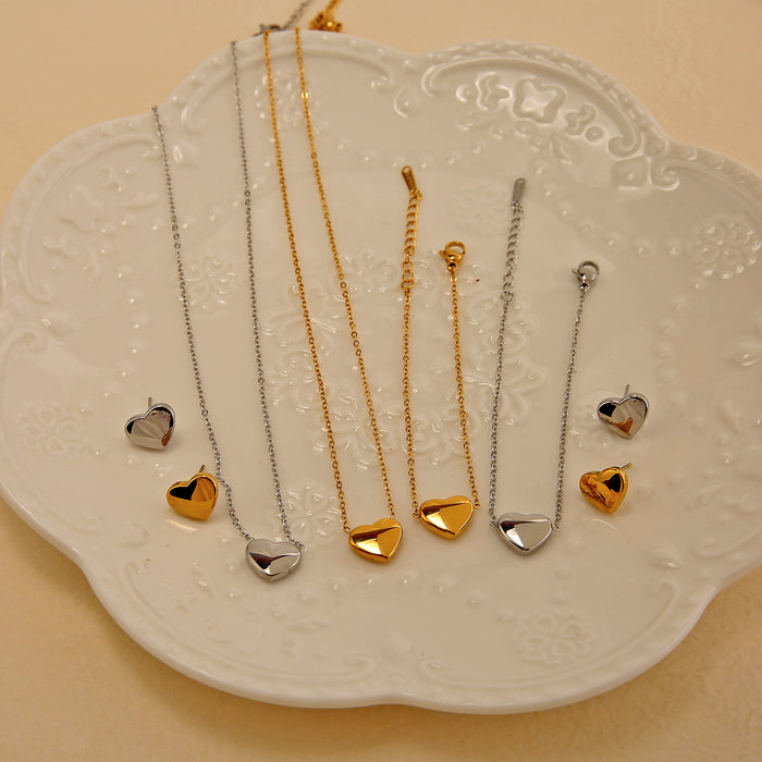 Wholesale Fashion classic stainless steel heart necklace bracelet earrings three piece set wholesale solid pendant