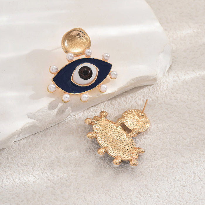 Wholesale Devil's Eye earrings have a niche, high-end, exaggerated personality, pearl earrings, and earrings