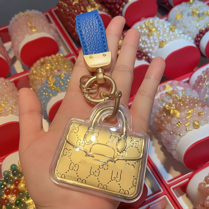 Wholesale Cute gold-colored bag keychain