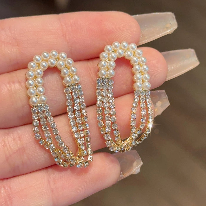 Wholesale Light luxury silver needle twisted circle earrings with multiple layers of versatile fashion personality earrings