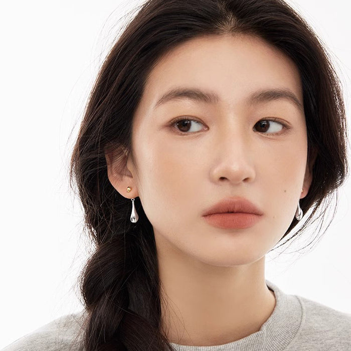 Wholesale Retro contrasting water droplet earrings with niche design, high-end sense, simple personality, fashionable temperament, silver plated earrings