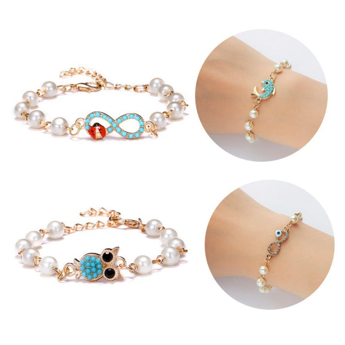 Wholesale Cross 8-shaped Round Hollow Rhinestone Pearl Bracelet JDC-BT-Chuya001