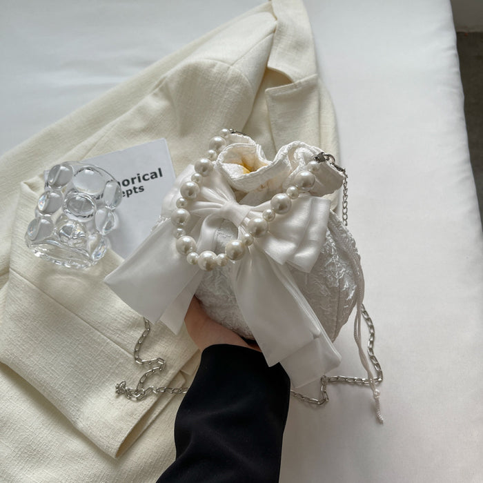 Wholesale Pearl bag, new fashionable bow chain bucket bag, niche and versatile crossbody bag
