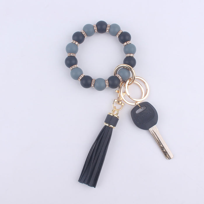 Wholesale Silicone bracelet wrist keychain tassel pendant