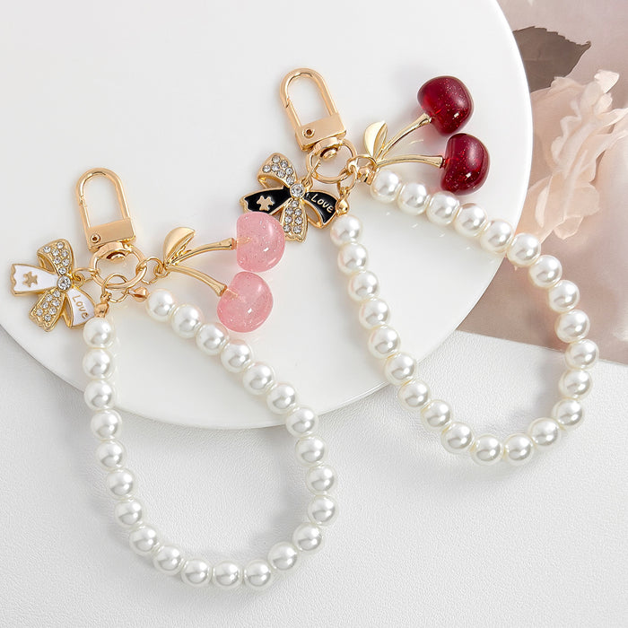 Wholesale Pearl chain beaded mobile phone lanyard bow pendant keychain