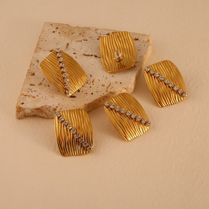 Wholesale Fashionable and personalized stainless steel zircon inlaid earrings and rings set, temperament earrings and bracelets