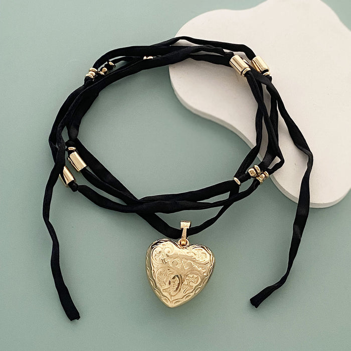 Wholesale three-dimensional relief love pendant long fabric trend necklace fashion