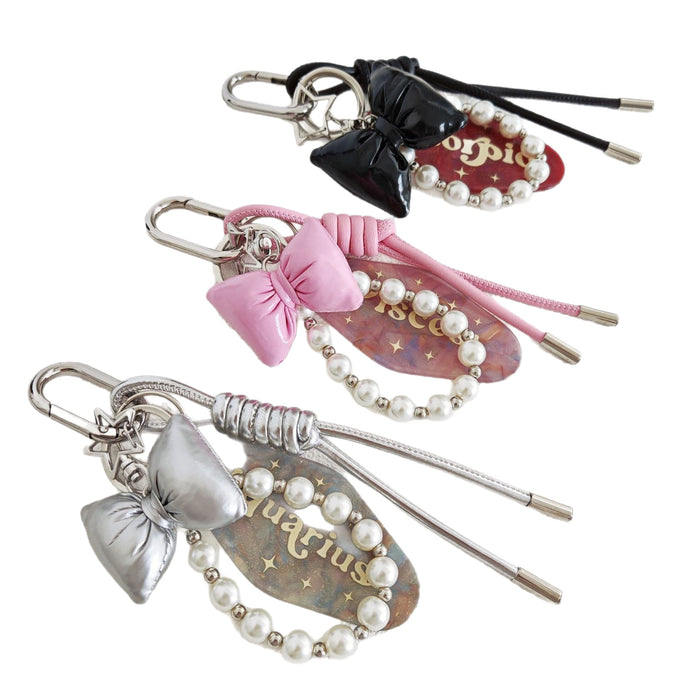 Wholesale Simple Bow Woven Leather Rope Pearl Chain Hanging Keychain