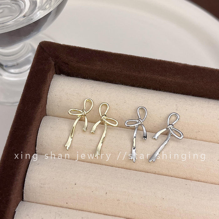 Wholesale Simple bow earrings girl fashion Joker cold wind earrings