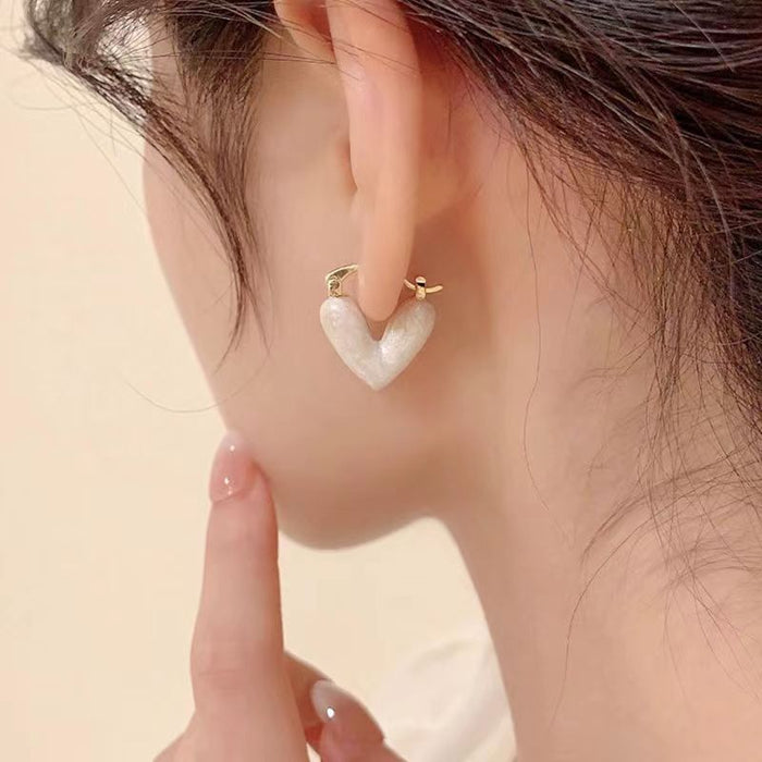 Wholesale Oil Drop Light Luxury Heart Shaped Ear Clip Earrings JDC-ES-Qik002