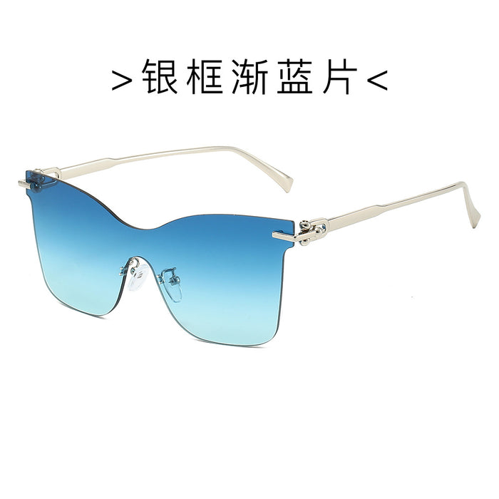 Wholesale Frameless one-piece sunglasses with a high-end feel, personalized trendy glasses, UV resistant cat eye retro sunglasses