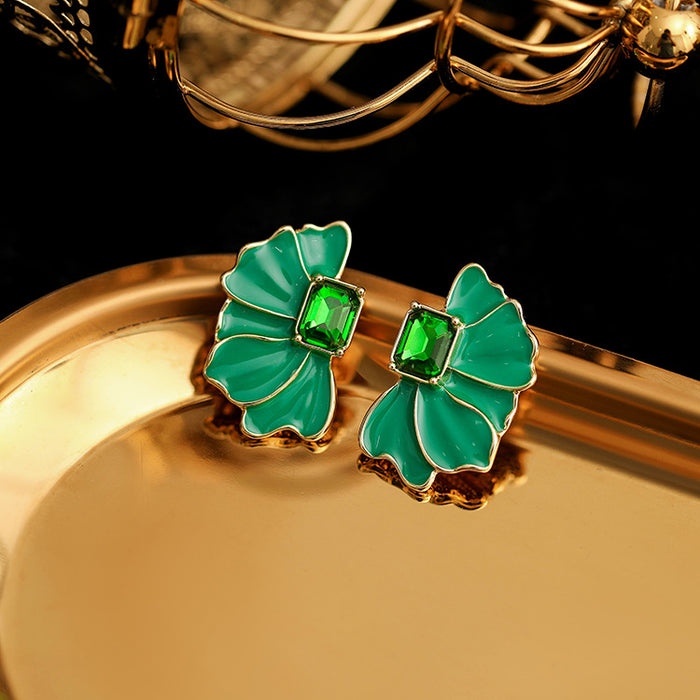 Wholesale Retro and minimalist design earrings with oil dripping, diamond studded, flower like temperament, fashionable earrings