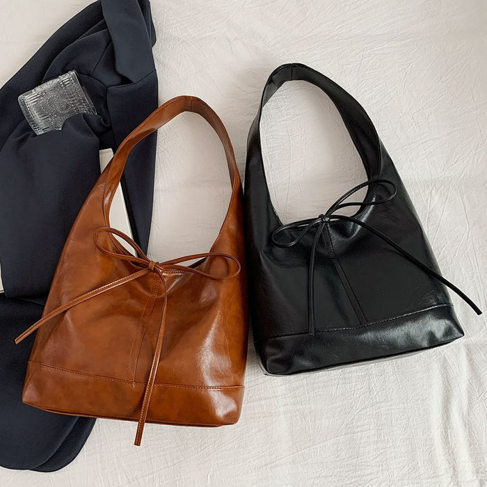 Wholesale Small commuting bag, versatile leisure bag, bow tie, large capacity single shoulder underarm tote bag